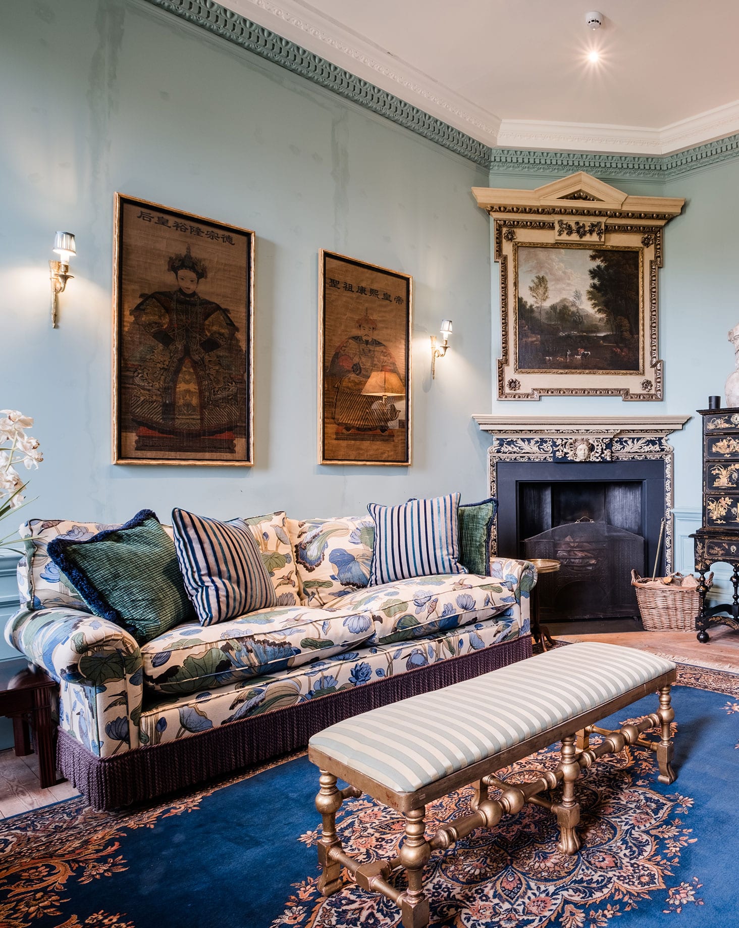 The Study at Hotham Hall with sofa and fireplace
